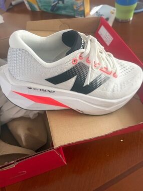 New Balance Women's White Sneakers with Black and Coral Accents
